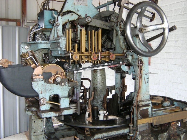 Brad located and posted the original operating manual for this bottle labeling contraption. Talk about things mechanical ! World Labeler machine from the 1940_s.jpg